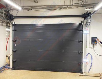 Секционные противопожарные ворота FireTechnics в Паркинг в ЖК